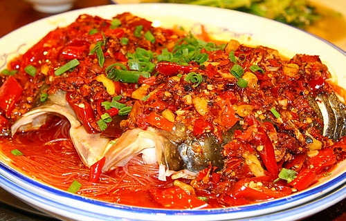 Steamed fish head with diced hot red peppers