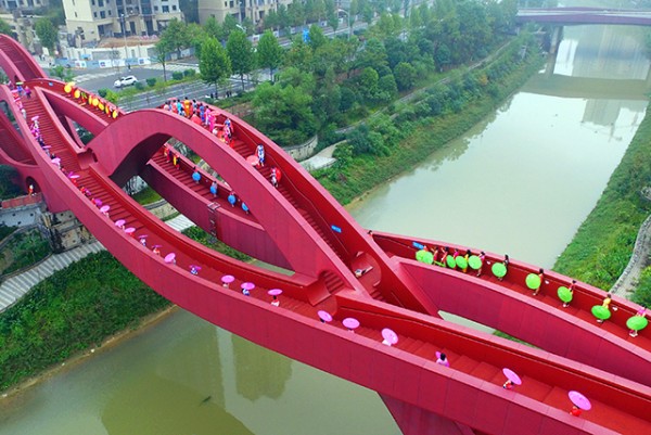 Embroidered Cheongsam Fashion Show on Chinese Knot Pedestrian Bridge
