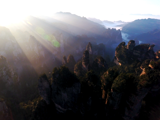 Sunrise in Zhangjiajie Huangshi Village after the rain