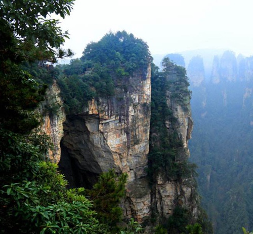 How can I get to the top of mountain for sightseeing in Zhangjiajie?